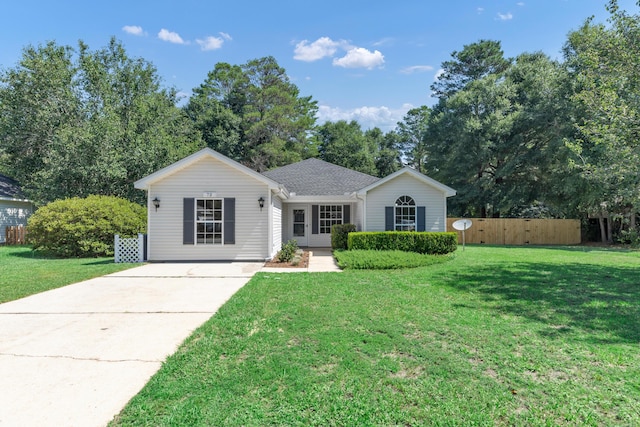 single story home with a front lawn