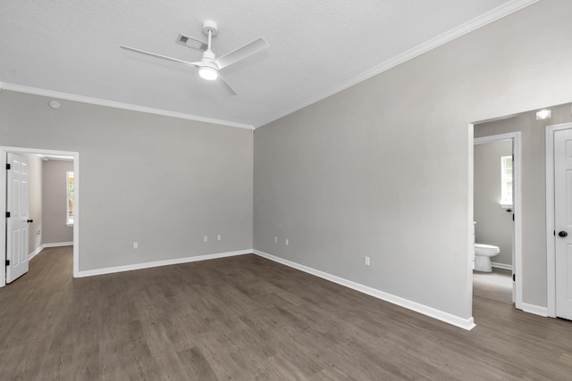 unfurnished room with ceiling fan, dark hardwood / wood-style floors, plenty of natural light, and a textured ceiling