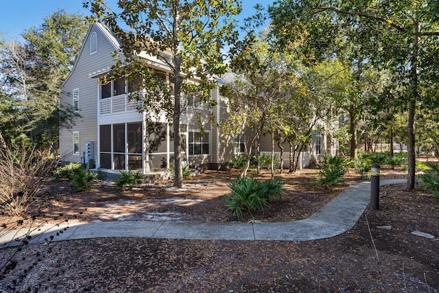 exterior space with a sunroom