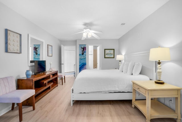 bedroom featuring ceiling fan and light hardwood / wood-style flooring