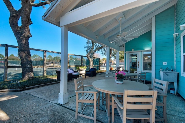 view of patio featuring ceiling fan