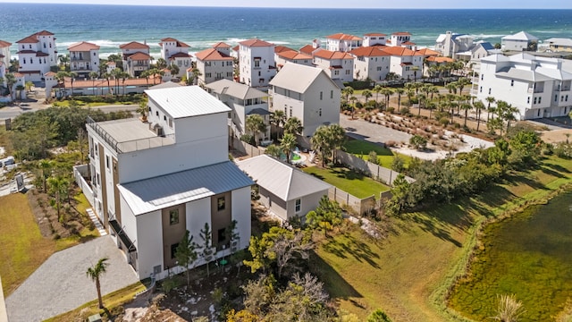 drone / aerial view with a water view