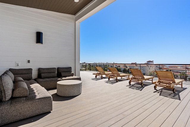 deck featuring outdoor lounge area