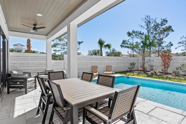 5050 W County Highway 30a, Santa Rosa Beach, FL 32459 - view of patio featuring a ceiling fan, outdoor dining area, a fenced in pool, and a fenced backyard