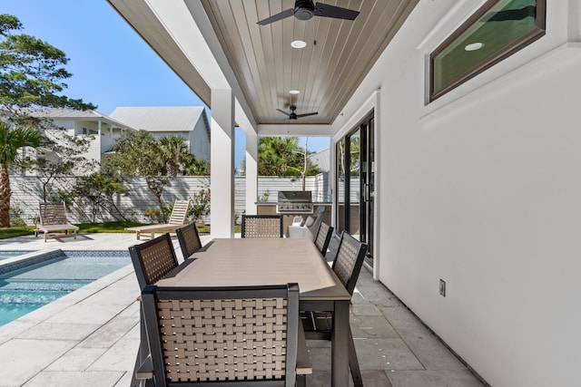 view of patio / terrace featuring a fenced in pool, ceiling fan, and a grill