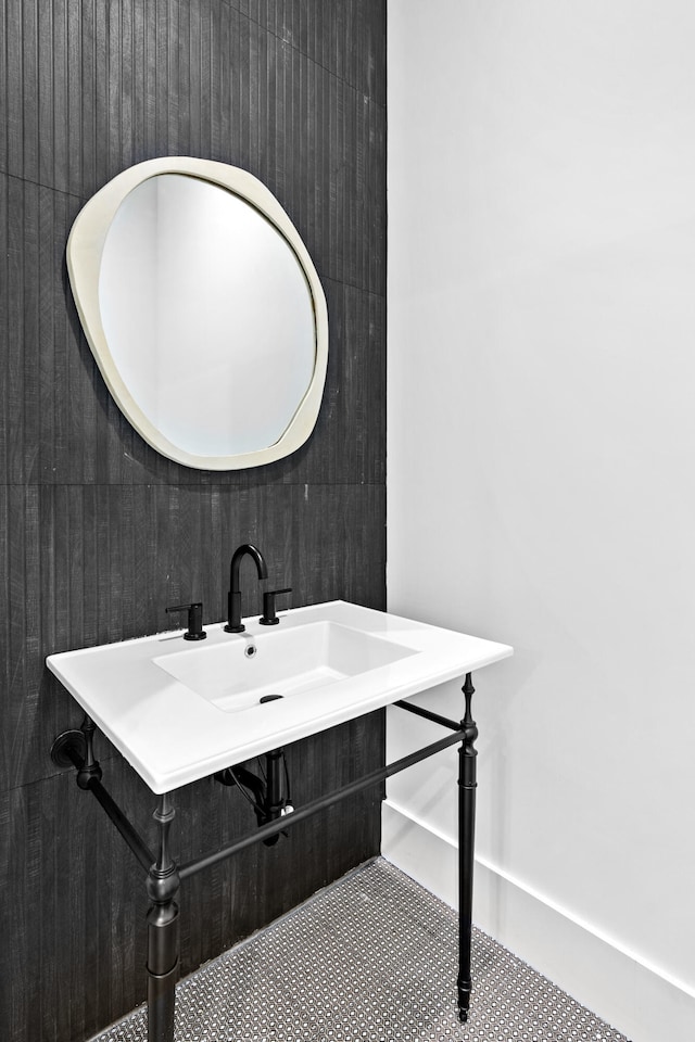 bathroom featuring tile patterned flooring and vanity