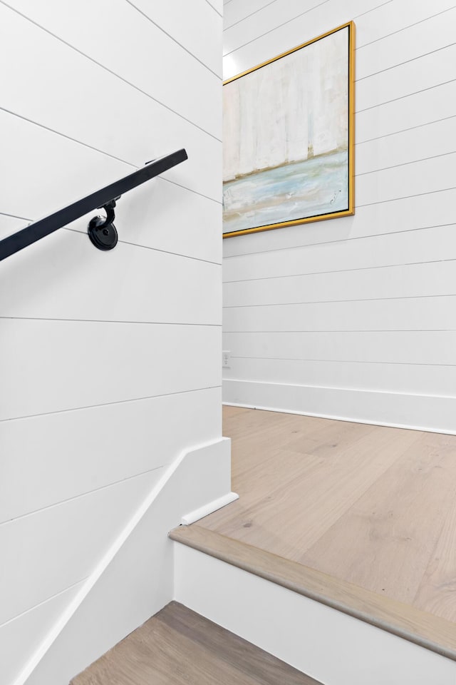 5050 W County Highway 30a, Santa Rosa Beach, FL 32459 - staircase with wood finished floors
