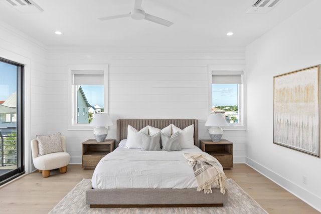 bedroom featuring access to outside, ceiling fan, and light wood-type flooring