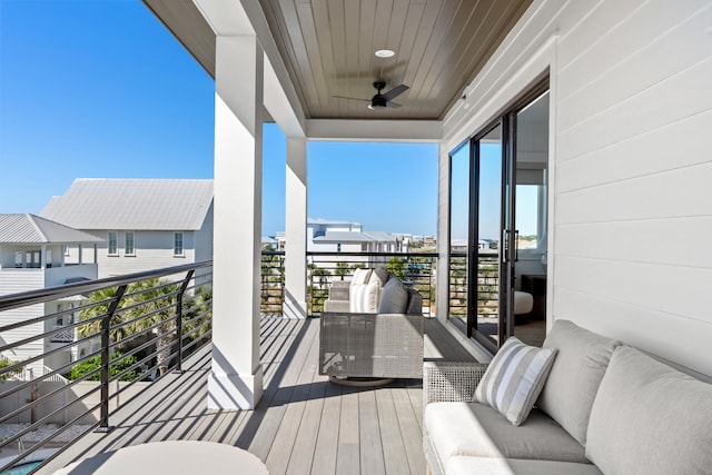 balcony featuring ceiling fan