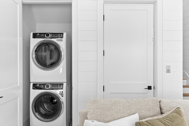 5050 W County Highway 30a, Santa Rosa Beach, FL 32459 - washroom with laundry area and stacked washer / dryer