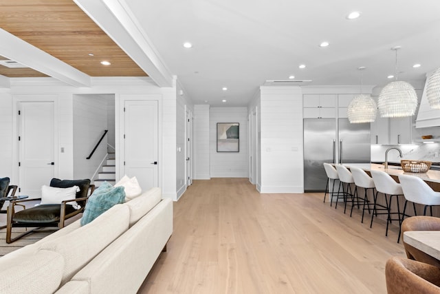 5050 W County Highway 30a, Santa Rosa Beach, FL 32459 - living area with baseboards, stairs, light wood-style floors, and recessed lighting