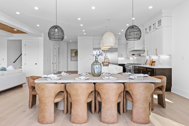 dining space featuring light hardwood / wood-style floors