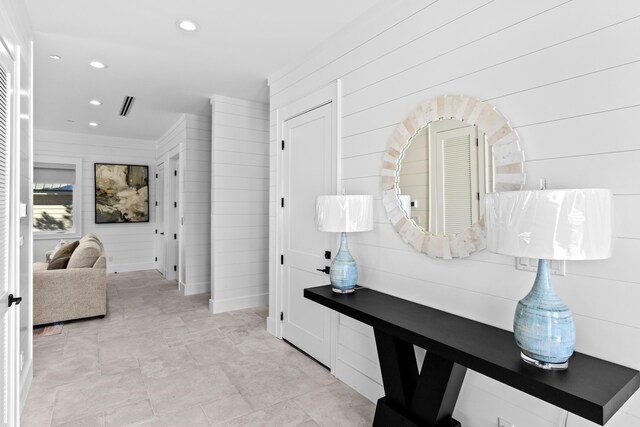 5050 W County Highway 30a, Santa Rosa Beach, FL 32459 - corridor featuring wood walls, visible vents, and recessed lighting