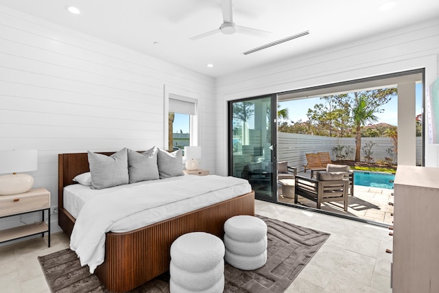 bedroom featuring multiple windows, access to outside, and ceiling fan