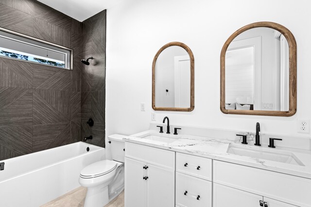 5050 W County Highway 30a, Santa Rosa Beach, FL 32459 - bathroom with double vanity, toilet, shower / bathtub combination, and a sink