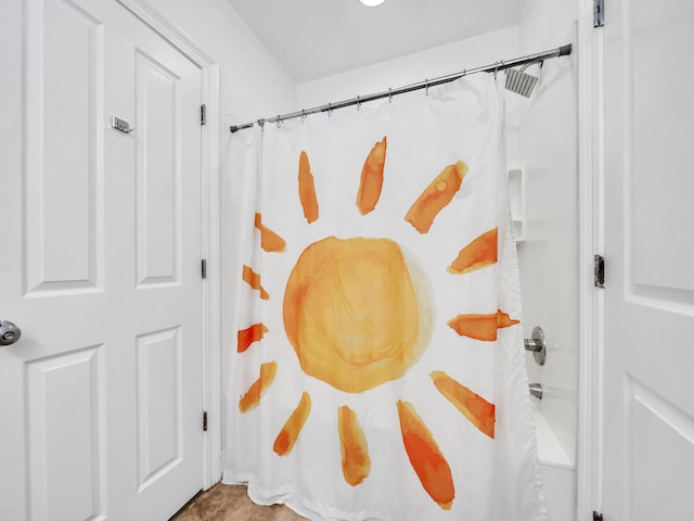 bathroom with curtained shower