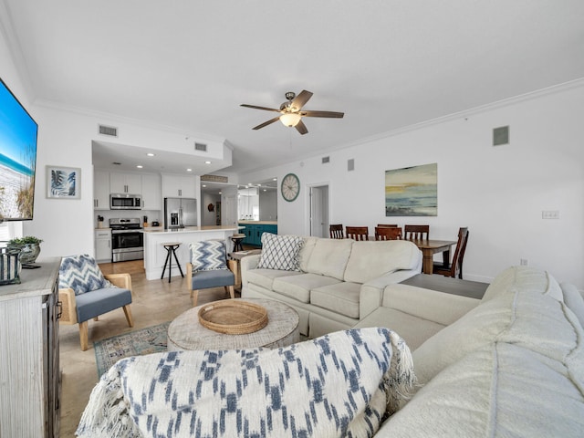 living room featuring crown molding and ceiling fan