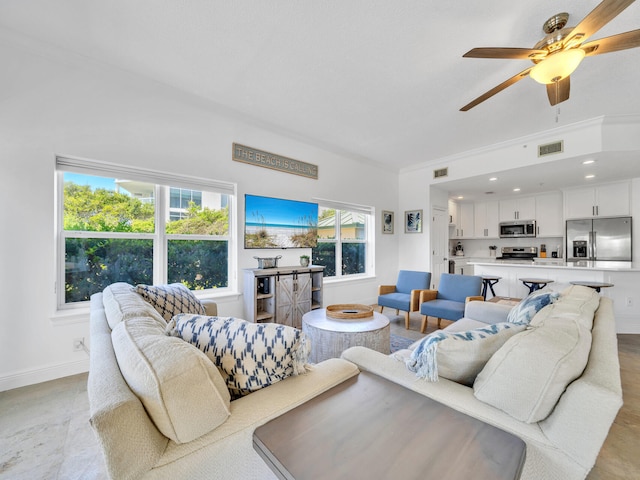 living room featuring ceiling fan