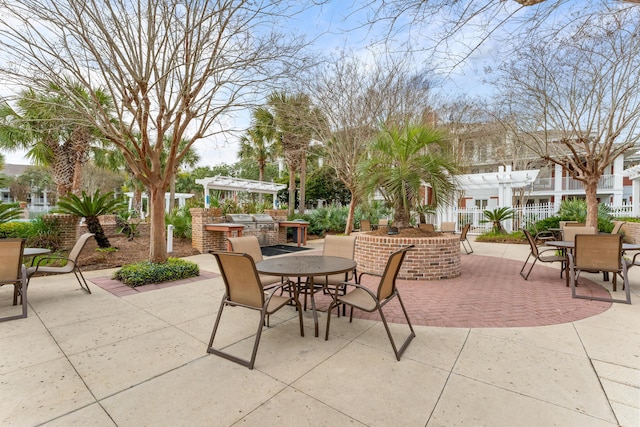 view of patio / terrace with a pergola and exterior kitchen