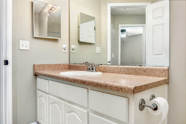 bathroom with vanity and ceiling fan