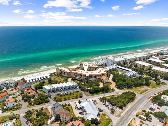 bird's eye view with a beach view and a water view