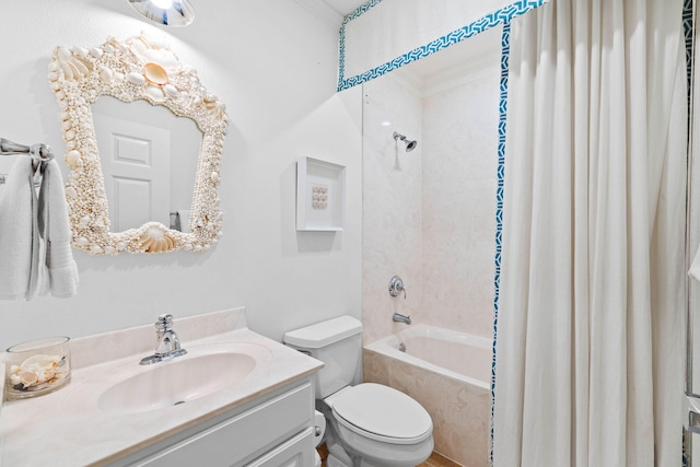 bathroom featuring vanity, toilet, and crown molding