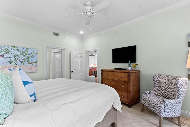 carpeted bedroom featuring ceiling fan and ornamental molding