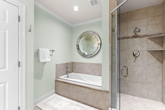 bathroom featuring independent shower and bath and ornamental molding