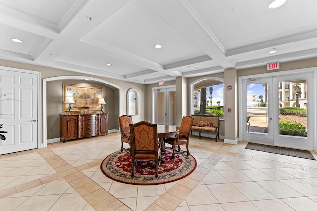 tiled dining room featuring coffered ceiling, beam ceiling, ornamental molding, and french doors