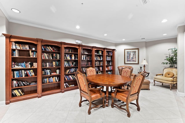 dining space featuring ornamental molding