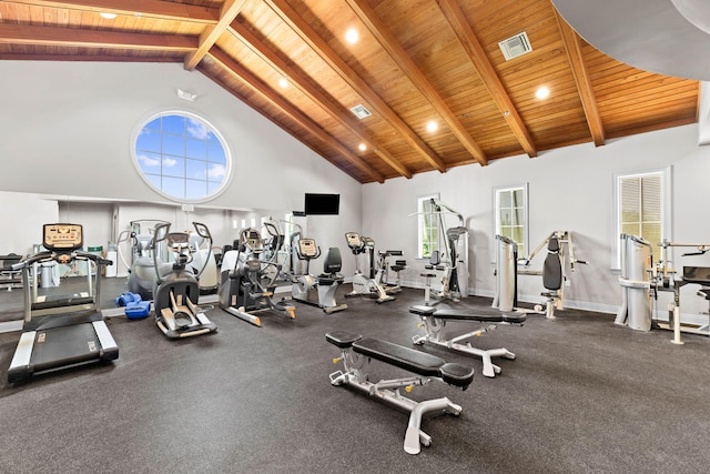 exercise room featuring high vaulted ceiling and wooden ceiling