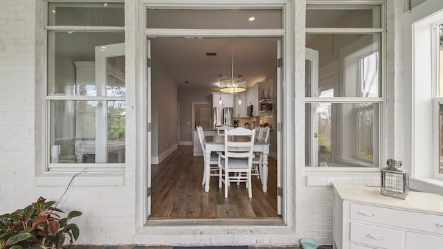 view of exterior entry featuring a garage