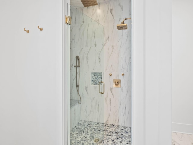 bathroom featuring an enclosed shower