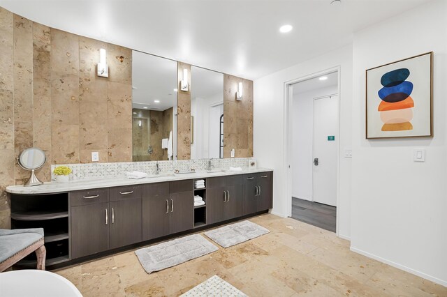 bathroom with vanity and tile patterned flooring