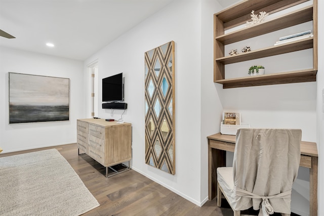 office with dark hardwood / wood-style floors