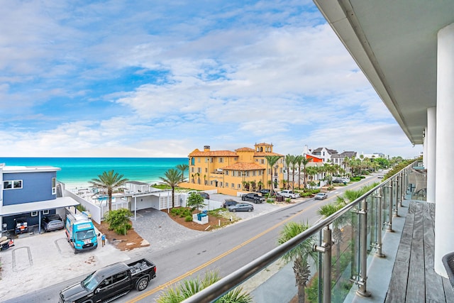 balcony featuring a water view