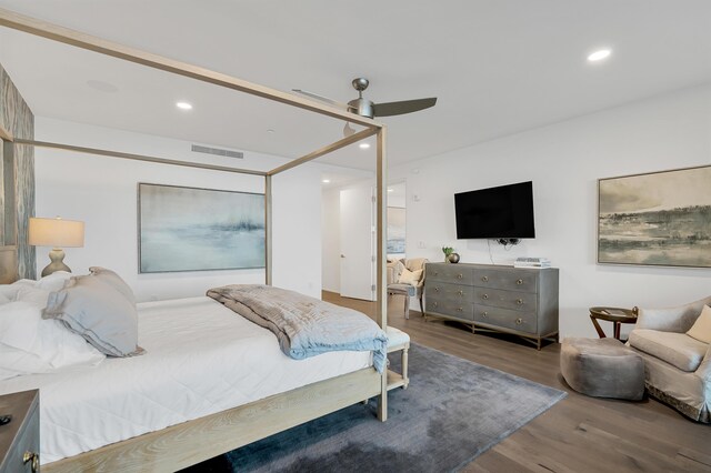 bedroom featuring ceiling fan and hardwood / wood-style flooring