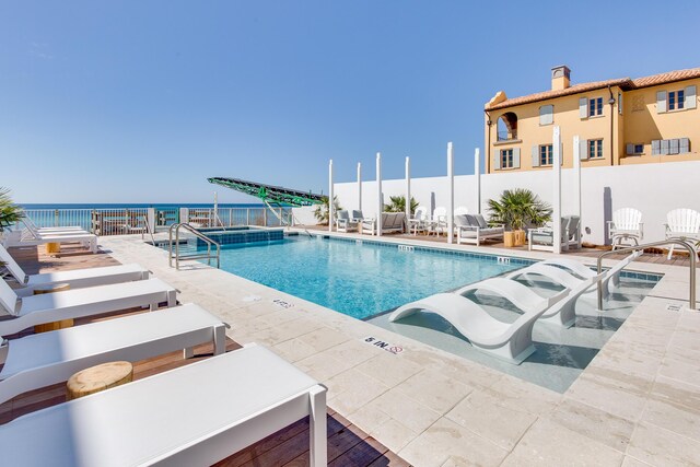 view of pool featuring a patio area