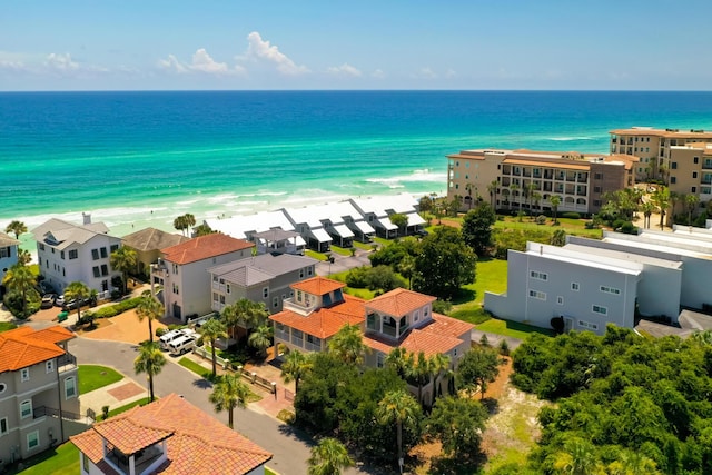 bird's eye view with a water view and a view of the beach