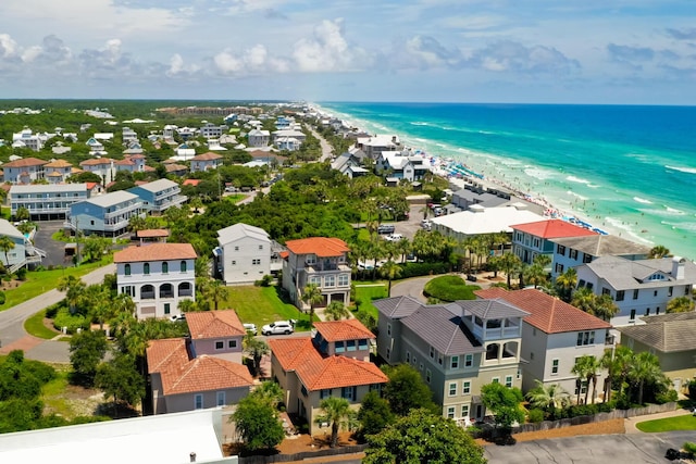 bird's eye view featuring a water view and a view of the beach