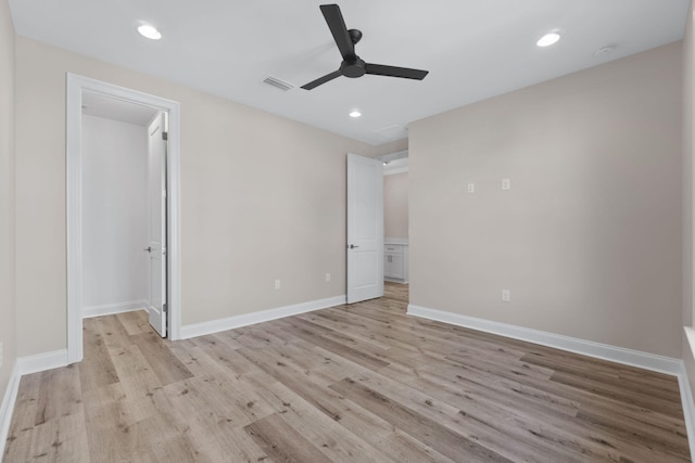 unfurnished bedroom with light wood-type flooring and ceiling fan