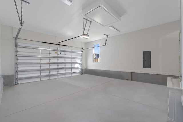 garage featuring electric panel and a garage door opener