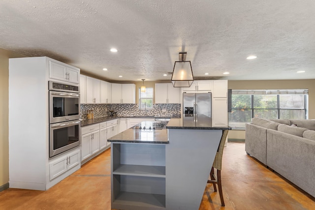 kitchen featuring tasteful backsplash, stainless steel appliances, concrete flooring, white cabinetry, and open shelves