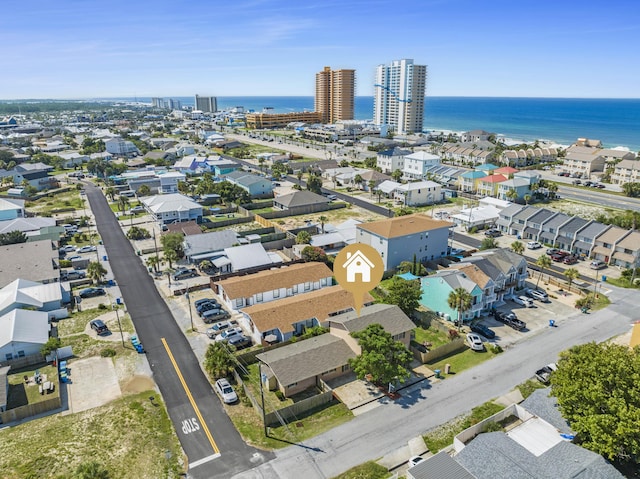 drone / aerial view featuring a water view and a city view