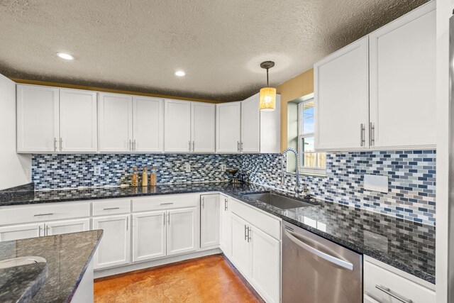 kitchen with a sink, tasteful backsplash, white cabinetry, and dishwasher