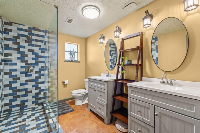 bathroom with a textured ceiling, a sink, visible vents, and a shower stall