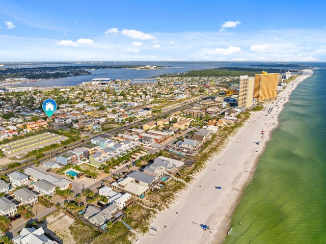 aerial view featuring a water view and a view of the beach