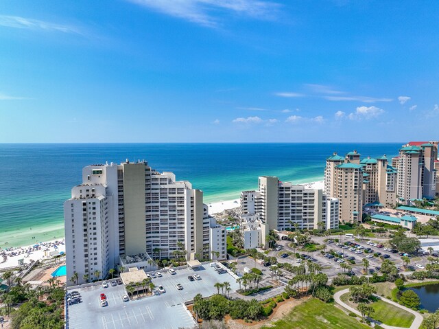 bird's eye view with a water view and a view of the beach