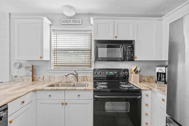 kitchen featuring light stone countertops, white cabinetry, sink, a textured ceiling, and black appliances