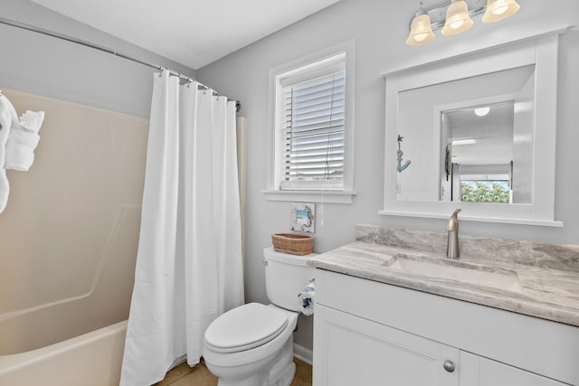 full bathroom featuring shower / bath combo with shower curtain, vanity, a textured ceiling, and toilet